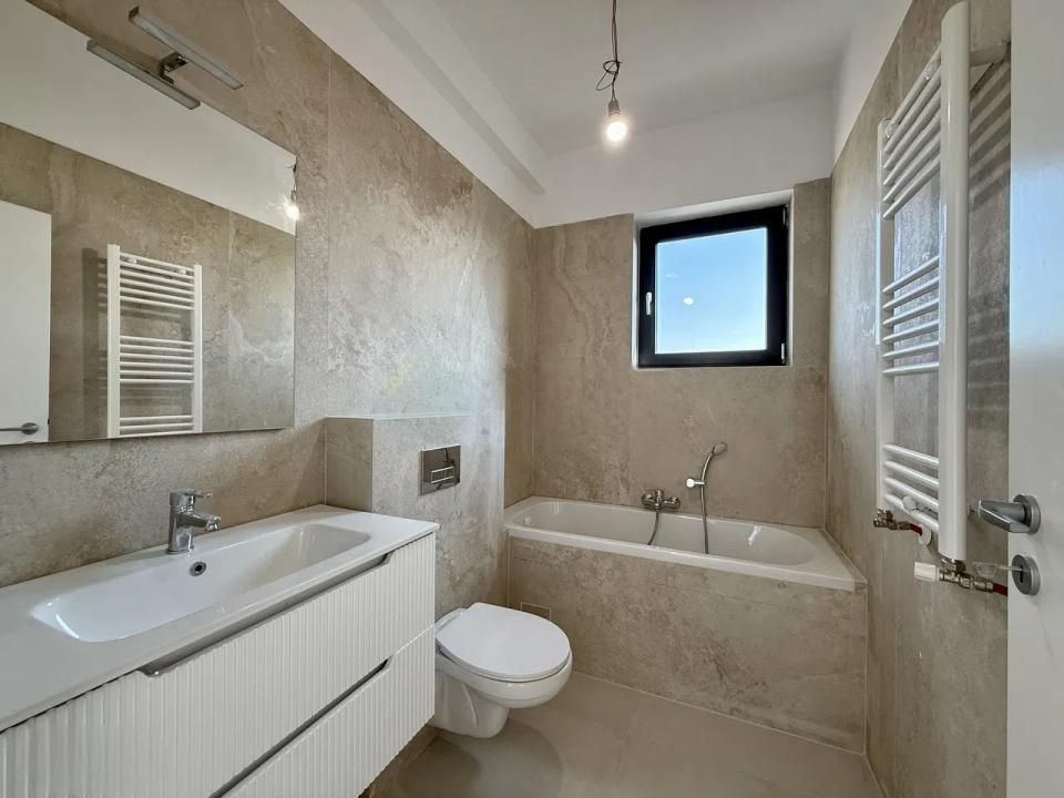 Casă cu 4 camere de vânzare în Tunari – fotografia 13 din 48