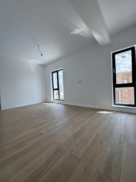 Casă cu 4 camere de vânzare în Tunari – fotografia 12 din 15