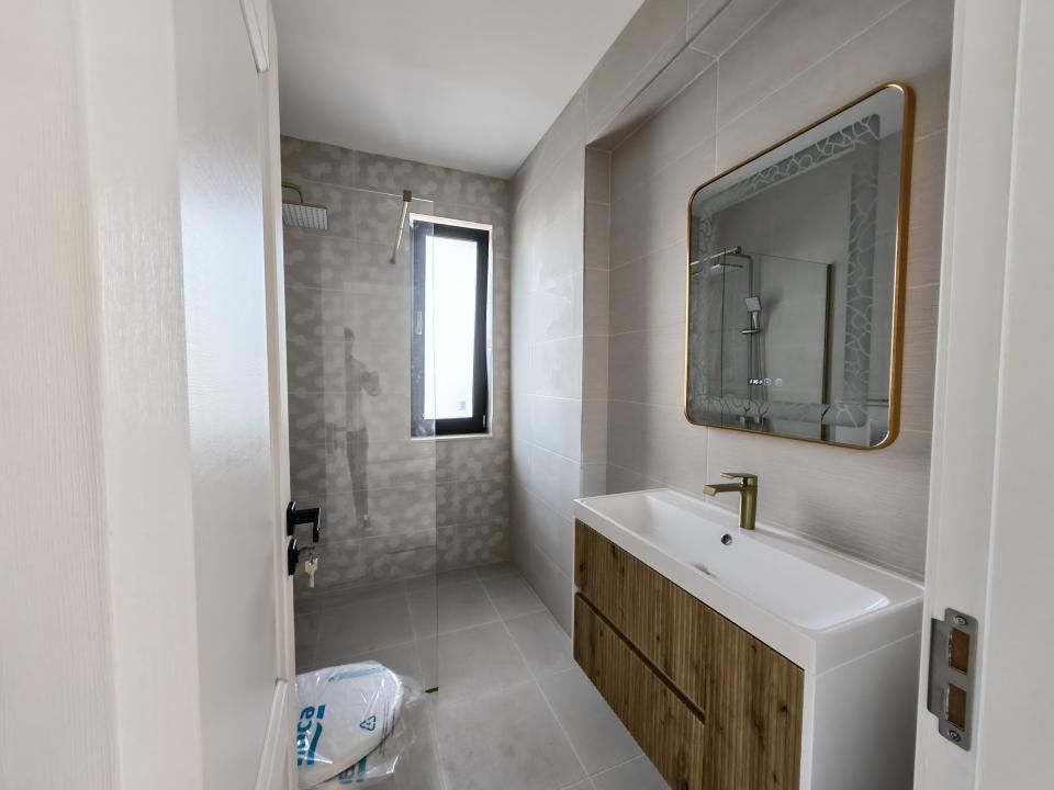 Casă cu 4 camere de vânzare în Est, Tunari – fotografia 15 din 27