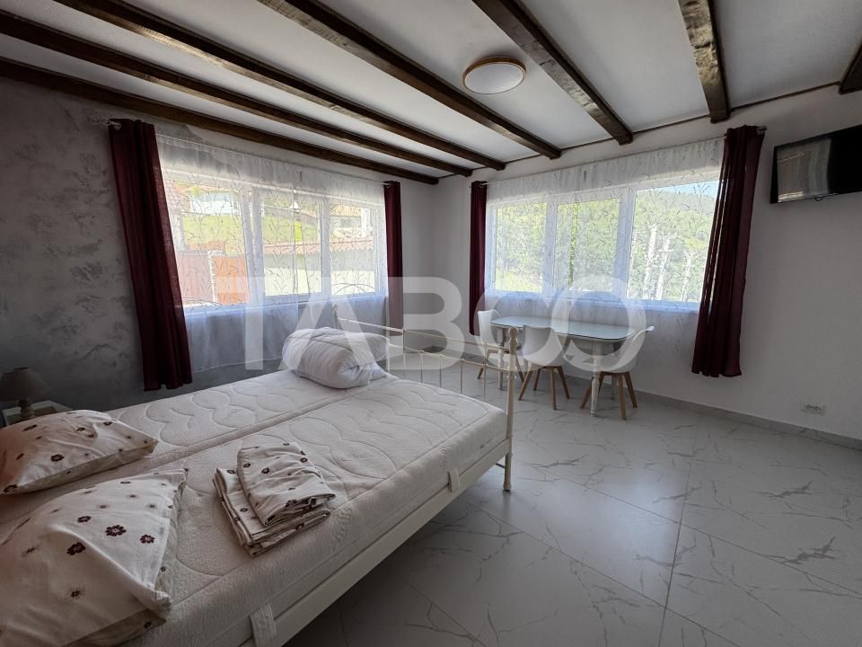 Casă cu 7 camere de vânzare în Rășinari – fotografia 21 din 32