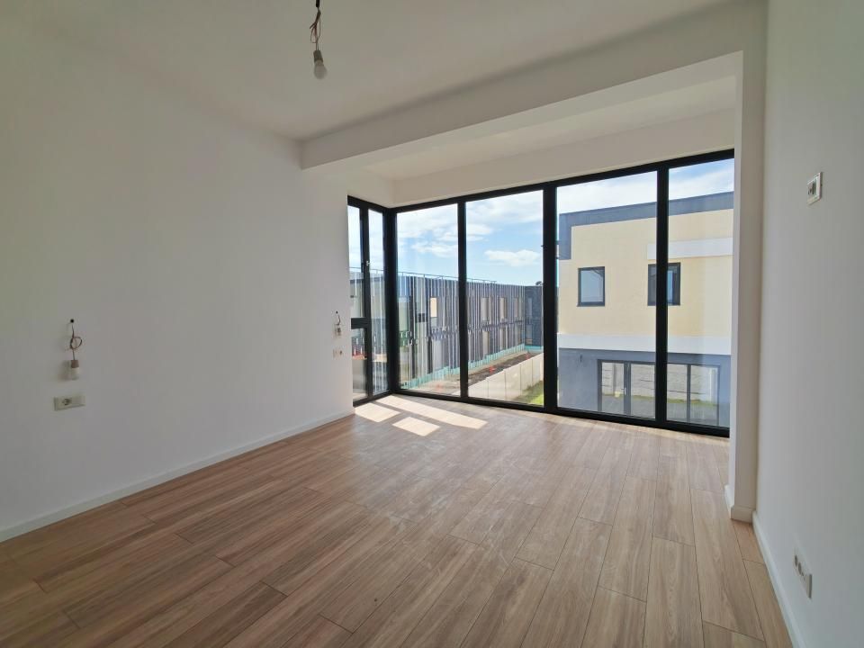 Casă cu 4 camere de vânzare în Tunari – fotografia 33 din 48