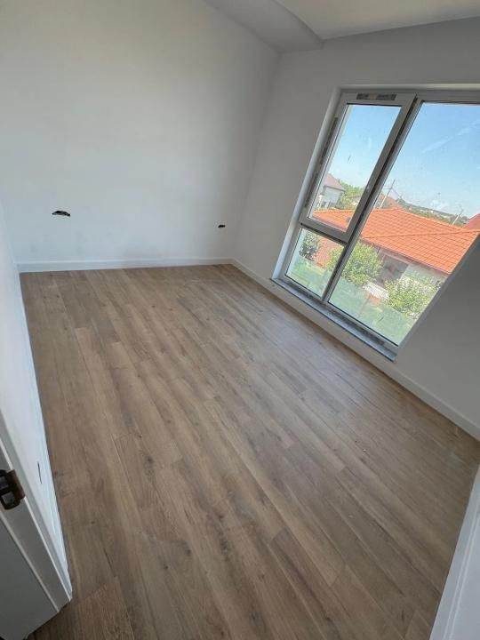 Casă cu 4 camere de vânzare în Tunari – fotografia 3 din 14