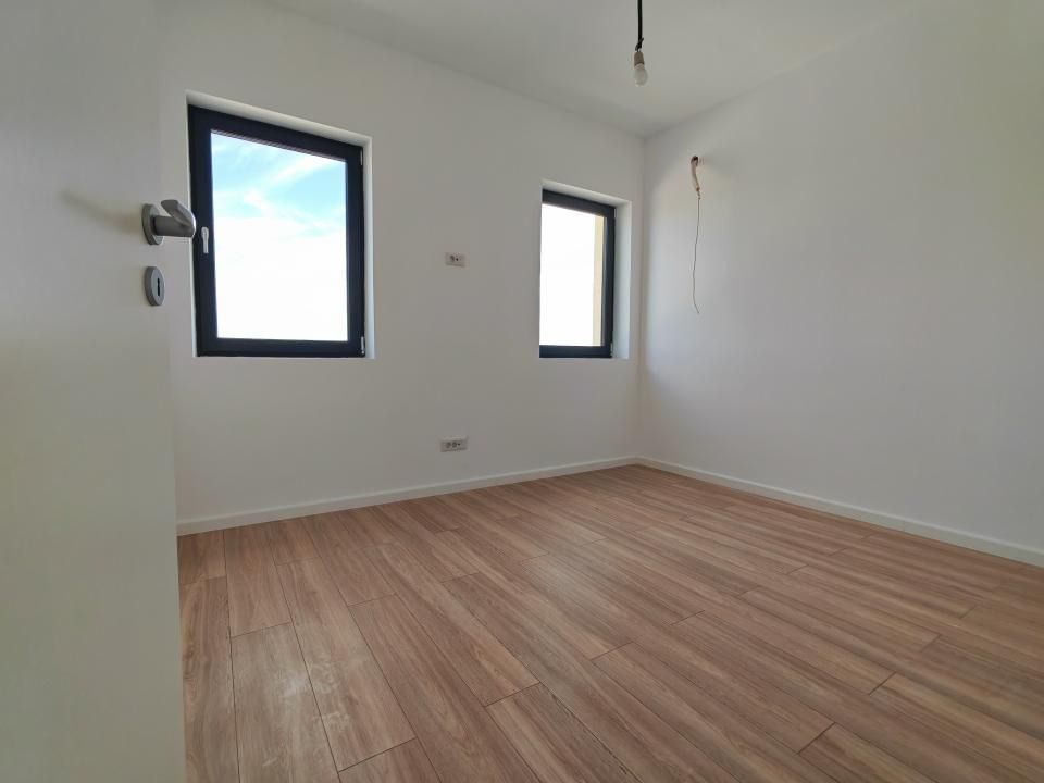 Casă cu 4 camere de vânzare în Otopeni – fotografia 17 din 22