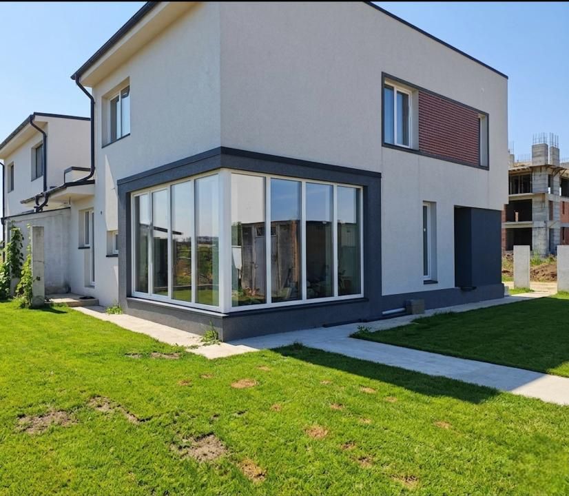 Casă cu 4 camere de vânzare în Otopeni – fotografia 4 din 11