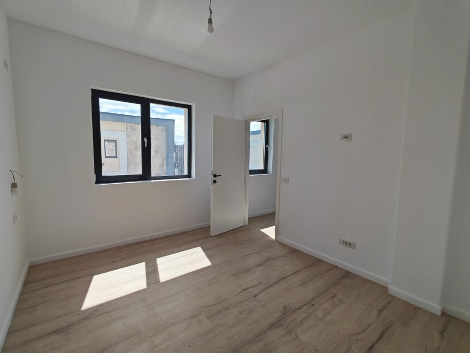 Casă cu 4 camere de vânzare în Otopeni – fotografia 4 din 22