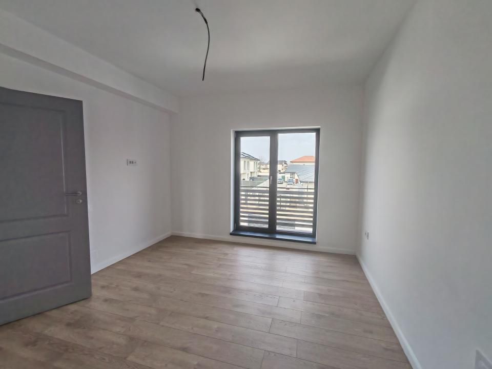 Casă cu 4 camere de vânzare în Otopeni – fotografia 14 din 15