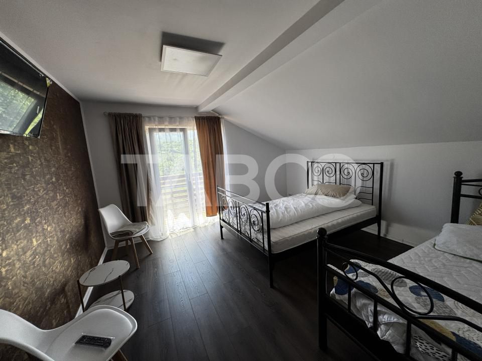 Casă cu 7 camere de vânzare în Rășinari – fotografia 8 din 32