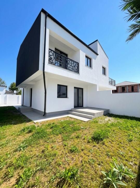 Casă cu 4 camere de vânzare în Central, Tunari – fotografia 28 din 28