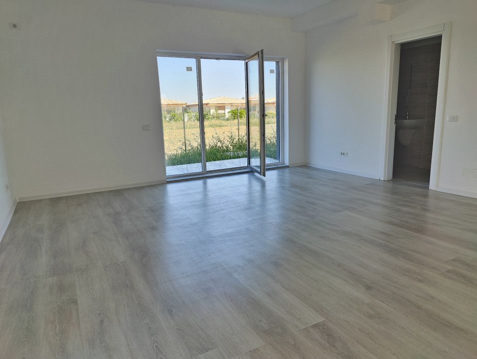 Casă cu 4 camere de vânzare în Central, Tunari – fotografia 4 din 17
