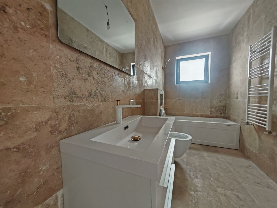 Casă cu 4 camere de vânzare în Tunari – fotografia 18 din 26