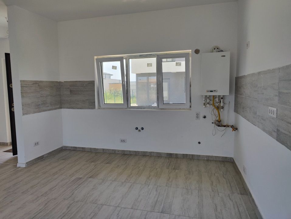 Casă cu 4 camere de vânzare în Central, Tunari – fotografia 7 din 17