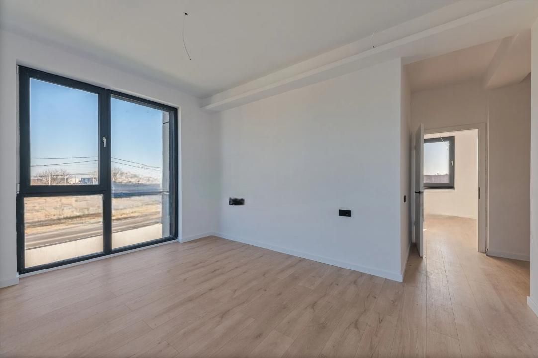 Casă cu 4 camere de vânzare în Central, Tunari – fotografia 4 din 9