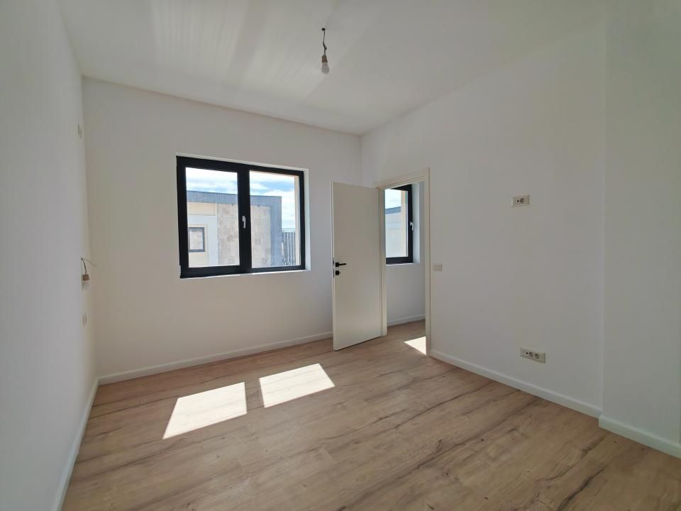 Casă cu 4 camere de vânzare în Tunari – fotografia 25 din 48