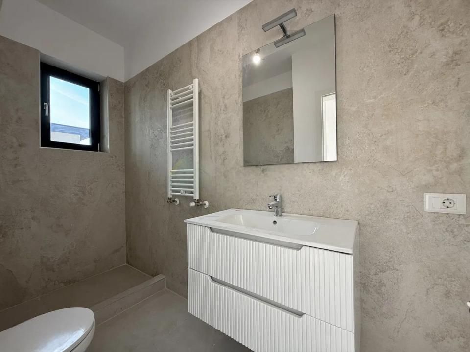 Casă cu 4 camere de vânzare în Tunari – fotografia 14 din 48