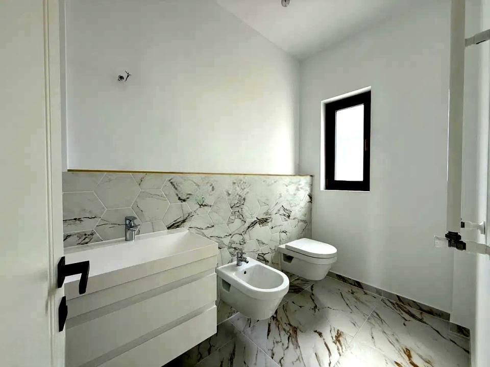 Casă cu 4 camere de vânzare în Tunari – fotografia 8 din 14